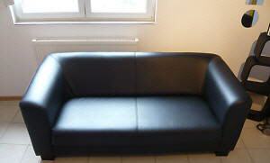 gebrauchte Möbel schwarzes Ledersofa