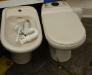 gebrauchte Toilette und Bidet